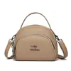 Nuevo bolso de mano simple de moda transfronteriza para mujer 2026 nuevo de moda independiente de tres capas de gran capacidad bandolera
