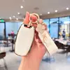 Adecuado para funda de llave Great Wall Haval H6, Haval M6 Plus de tercera generación, Big Dog F7X, Red Rabbit H9, First Love H2S, con carcasa y hebilla para mujer