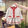Traje infantil estilo Chanel suéter de amor de niña dulce estilo coreano falda de punto a rayas traje de dos piezas