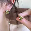 Pendientes de botón de flor de lazo de cristal con circonita cúbica de aguja plateada Pendientes de personalidad fresca y dulce Joyería para orejas de lujo ligero y de alta gama para mujer