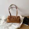 Bolso de mano sencillo, gamuza, estilo coreano de otoño, bolso de axila, vintage, elegante, versátil, diseño nuevo, adecuado para ir al trabajo, de mujer, 2026
