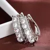 Comercio exterior transfronterizo venta caliente moda estilo coreano aretes personalizados de moda con incrustaciones de circonita aretes diarios simples y elegantes
