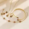 Conjunto de joyería en forma de corazón más vendido transfronterizo europeo y americano: pulsera con forma de corazón, pendientes, collar, anillo, juego de accesorios para mujer de varias piezas