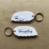 Cuchillo de empuje de material nuevo con llavero retráctil automático mini cuchillo cuchillo mini de llavero