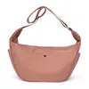 Bolso de Mujer 2026 Nueva Tendencia Transfronteriza Urbano Simple Ligero Bolso Cruzado Bolso de Hombro de Nailon Bolso Casual Tipo Empanada