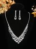 Collar y pendientes de cadena de eslabones de dos piezas, muy populares entre las mujeres, con exquisitos accesorios para la cena, llenos de diamantes de imitación.