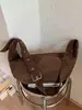 Otoño Invierno Retro Gamuza Cuerno Bolso Mujer 2026 Nuevo Casual Correa Ancha al Hombro Bolso Cruzado de Hombro Único Bolso de Sillín Coreano