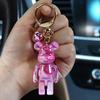 Nuevo llavero colgante de oso mágico bicolor de colores para bolsa de coche, accesorios para llaves de oso de muñeco de dibujos animados al por mayor