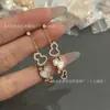 Pendientes de alta gama en forma de calabaza de oro V con incrustaciones de ágata roja y diamantes, delicados y compactos, diseño hueco, pendientes versátiles, directo del fabricante