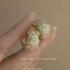 Pendientes de Flor de Gota de Diamante de Aguja Plateada Versátiles Simples de Gama Alta Pendientes de Nicho Temperamento Pendientes de Moda Wholesale Mujeres