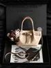 Bolso de Mano Pequeño de Primavera para Mujer 2026 Modelo Nuevo Textura de Alta Gama Nicho Bolso Cruzado de Lujo Ligero para Salir al Trabajo Bolso Tote Pequeño