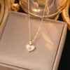 Collar de acero de titanio nuevo sin decoloración para mujer, cadena de clavícula ligera de lujo de verano, nicho, todo-partido, joyería de temperamento de alta gama