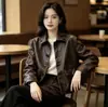 Chaqueta de cuero retorcido 2026 Coreana Dongdaemun cuello solapa abrigo corto de cuero chaqueta de cuero holgada abrigo de otoño e invierno top