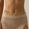 Cadena para el cuerpo transfronteriza europea y americana más vendida, elegante cadena para el pecho de concha de perla sintética, cadena de cintura de playa única y moderna para mujer