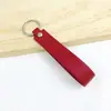 Llavero de PU de color sólido transfronterizo creativo de color caramelo banda ancha de cuero cuerda para la mano simple para llaves de coche de hombre venta al por mayor