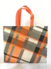 Bolsa no tejida de color spot recubierta con prensado en caliente bolsa de regalo publicitaria bolsa de compras de ropa no tejida portátil impresión de logotipo