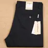 Otoño 2020 nuevo hombres algodón grueso recto slim elástico color liso Tencel hombres pantalones casuales de negocios