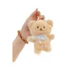 Popular de Internet Lindo Lindo Babero Colgante de Oso Peluche Muñeca Dibujo Animado Colgante de Bolsa Llavero Muñeca Muñeca