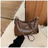Bolsa de Axila Estilo Pequena Fragrância Super Quente Transfronteiriça Feminina 2026 Nova Versátil Bolsa Dumpling com Corrente Alta Aparência Moda Bolsa Transversal