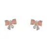 Pendientes Exquisitos de Moda Japoneses Coreanos con Pequeño Circonita Perla Lazo para Mujer Elegantes de Lujo Ligero Versátiles Super Brillantes Venta al por Mayor