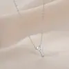 Chapado en oro real circonita cadena para clavícula de temperamento diseño de nicho femenino collar con letra Y collar de personalidad Joker venta al por mayor