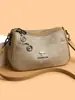 Elegante y espaciosa bolsa de mano para mujer, bolso cruzado retro, nueva colección 2026, bolso de hombro versátil estampado para mujeres de mediana edad