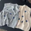 Nuevo chaleco de punto sin mangas de cuello redondo, estilo coreano, para mujer, de corte holgado, adelgazante y versátil, con un pequeño estampado floral.