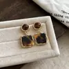 Pendientes Colgantes Populares de Piedra Ojo de Tigre Aguja de Plata Maillard Retro Elegantes Versátiles Pendientes de Lujo Accesible Pendientes de Gama Alta para Mujeres