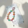 Nueva cadena para teléfono de cuentas esmeriladas transfronteriza, colgante para teléfono de cadena de cuentas de goma acrílica adecuado para bolsos y llaveros de coche