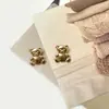 Oso de dibujos animados lindo dorado claro pierna alta botón de metal abrigo de tweed cárdigan suéter top hebilla decorativa