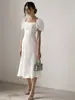 Nuevo Vestido Blanco de Manga Abullonada Estilo Puro Deseo Otoño e Invierno 2026 Moda Europea y Americana Transfronteriza Vestido Elegante de Gama Alta