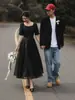 Vestido de noche negro de longitud media para mujer estilo Hepburn, adecuado para sesiones de fotos en estudio, reuniones de parejas y fiestas, ofreciendo un look elegante y sofisticado, adecuado como vestido de novia ligero