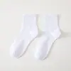 Calcetines Zhuji Primavera y Otoño Color Sólido Blanco y Negro Calcetines Deportivos para Hombres y Mujeres Estudiantes, Transpirables, Absorbentes de Sudor, Resistentes al Olor, Largos y de Longitud Media