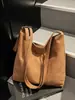 Bolsa Suede Retrô de Inverno para Mulheres 2026 Nova Bolsa de Ombro Versátil de Grande Capacidade Bolsa Tote Fashion para o Dia a Dia Tendência