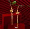Loja de Ouro Mesmo Estilo Brincos Longos com Borla de Borboleta Vazada para Mulheres, Cor Duradoura, Brincos de Moda de Luxo Leve, Atacado de Joias
