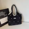 Bolsa de Tecido Casual Fresca Versátil Transfronteiriça Nova 2026 para Mulheres, Bolsa Tote Leve para Trabalho e Deslocamento, Bolsa de Ombro