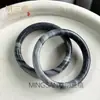 Venta al por mayor del fabricante Pulsera de Pollo Negro Color Esmeralda Pulsera de Jade Ceroso Paisaje Mitad Blanco y Negro Humo de Tinta Lluvia Hielo Jade Carbonatita
