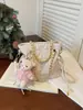 Bolsa de Ombro Única com Relevo Retrô Feminina 2024 Nova Primavera Elegante Bolsa de Ombro Único com Corrente Bolsa Transversal Simples e Fashion