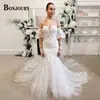 Vestido de Novia 2026 Verano Nuevo Estilo Hombros Descubiertos Vestido de Novia de Comercio Exterior con Falda Amplia y Encaje Soluble en Agua Vestido de Novia de Comercio Exterior con Cola