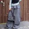 Conjunto de estilo casual para niñas, nueva colección otoño 2026, para niños mayores, con una camiseta de manga larga de dos piezas simuladas y pantalones largos con dobladillo de volantes