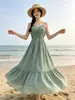 Vestido Longo Sem Costas Design Estilo Francês 2026 Vestido de Alça com Decote V Férias de Verão na Beira-Mar