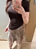Falda Larga Mini de Leopardo con Hilo Dorado Sexy Retro Americano para Mujer Verano Temperamento Versátil Cintura Alta Delgada Línea A