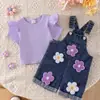 Conjunto de camiseta roxa de verão sem mangas para meninas com bordado de flor em toalha e shorts macacão jeans, um conjunto de duas peças para meninas pequenas