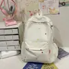 Mochila transfronteiriça de alto valor, estilo japonês, para estudantes universitários, do ensino fundamental e do ensino médio, nova mochila doce para o campus 2026