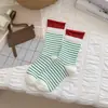 Calcetines de moda nuevos para otoño e invierno, diseño de bloques de color a rayas de canalé doble, transpirables, estilo preppy, longitud a media pantorrilla, venta al por mayor desde Zhuji