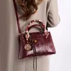 Bolsas Femininas 2025 Outono e Inverno Nova Moda Elegante Versátil Em Relevo Transversal Ombro Bolsa Grande Moderna