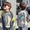 Ropa de otoño para niños de manga larga 100% algodón 2026 nuevo estilo raglán con bloques de color informal cuello redondo moderno y genial