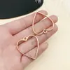 Marco abrasivo de gota de pegamento con figura geométrica de gota de agua de amor hueca de cuatro colores, accesorios de joyería de aleación DIY al por mayor