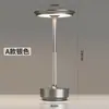 Lámpara de mesa recargable tipo OVNI de lujo con control táctil, hecha de metal y aluminio, para bares, restaurantes, camping y como luz nocturna ambiental de mesita de noche.