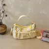 Bolsa de nylon estilo coreano con cordón de gran capacidad para mujer, nueva bolsa cruzada de un solo hombro de nicho 2026, bolsa de mano plisada para la escuela